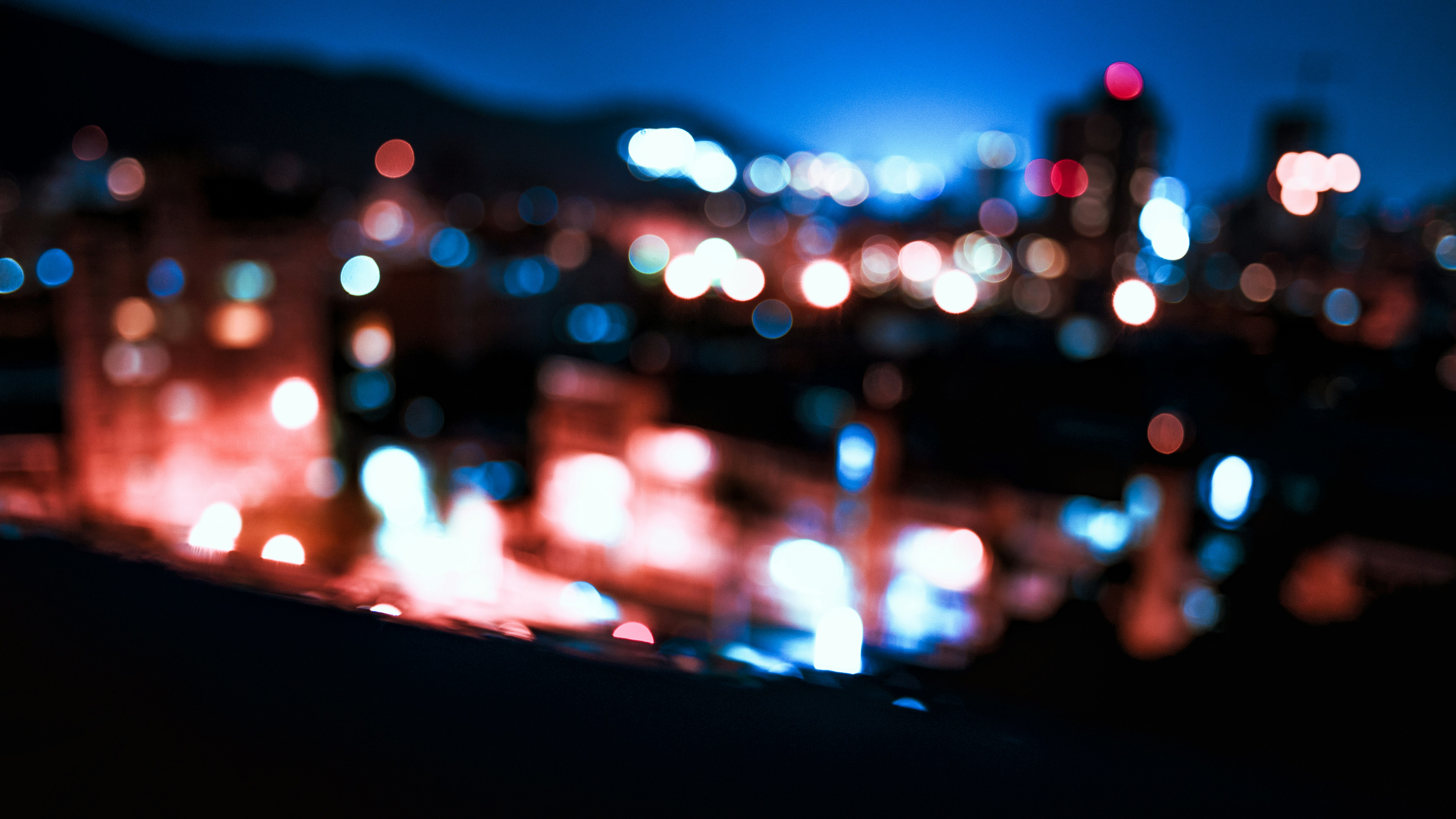 bokeh photography of city lights during night time